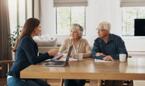 Senior couple, meeting and investment with a financial advisor